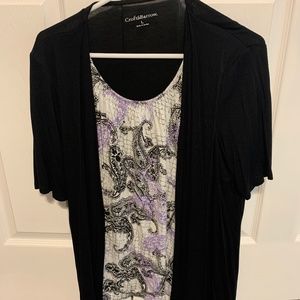 One piece short sleeve shirt that’s black, purple and white